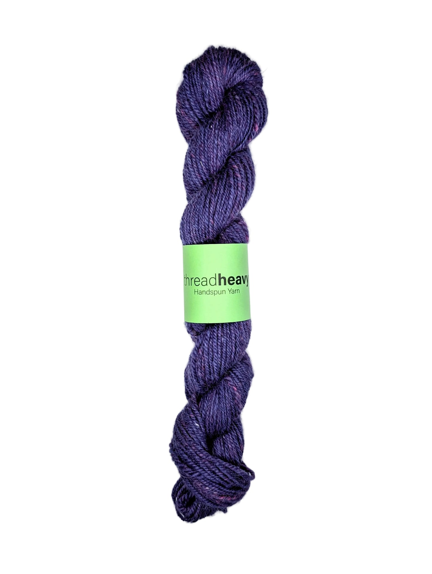 Purple skein of yarn with a green label on a white background